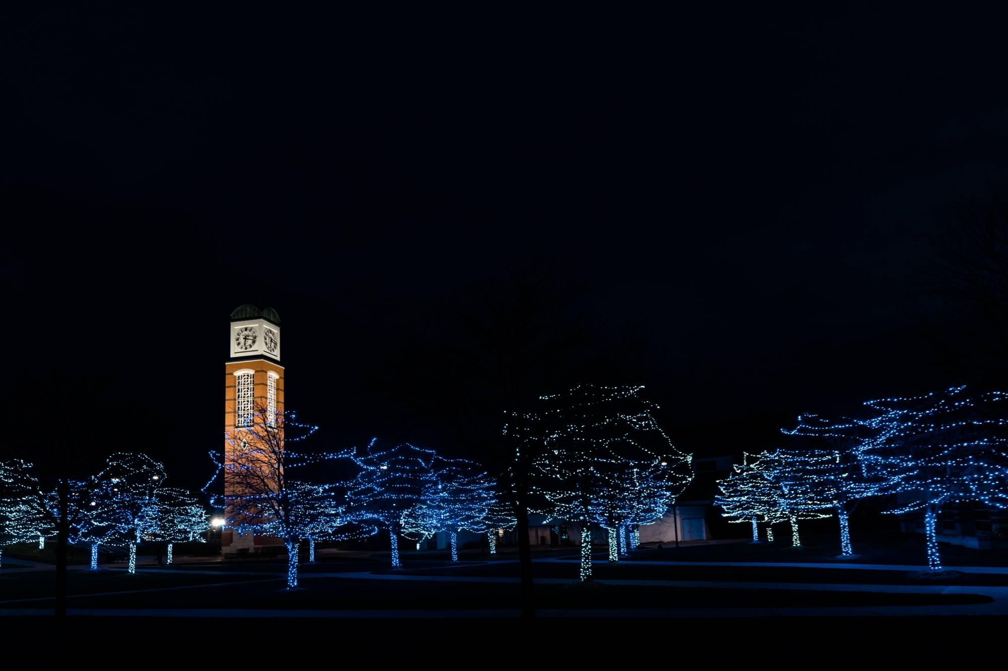 The Cook Carillon Towe on GVSU's Allendale Campus at night with lights